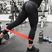 Rött Body Science Short Power Resistance Band träningsband på gymmet